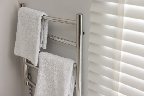 A heated towel rail installed in the bathroom