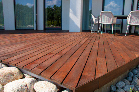 Brand new dark wood garden decking.