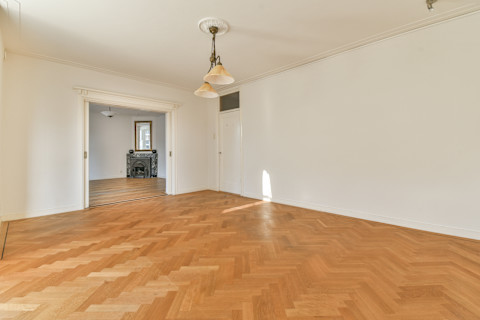 A room featuring Amtico flooring, showcasing a stylish and durable design with a pattern or color scheme that complements the room's decor and furniture.