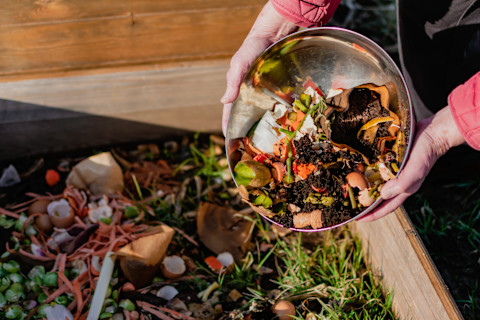 Gardener making compost