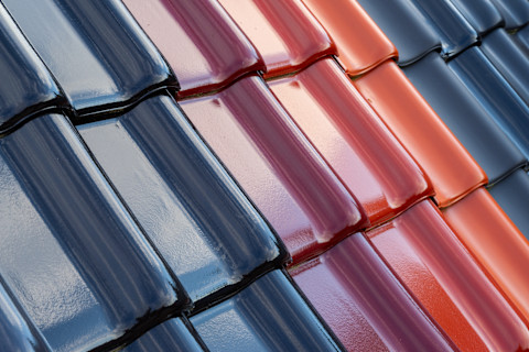Roof tiles, variety of color shades, close-up.