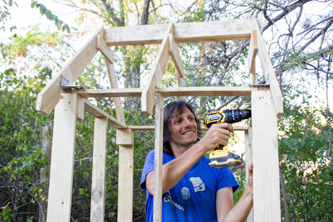 man-builds-small-shed