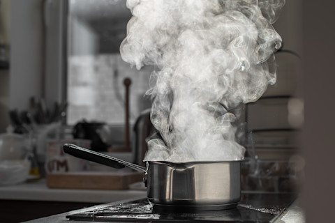 Boiling pot on kitchen stove