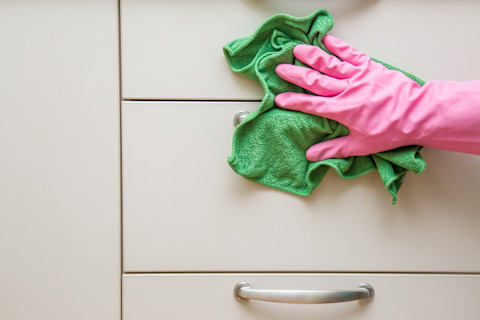 Cleaning kitchen cabinets