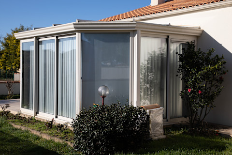 A traditionally designed white conservatory extension