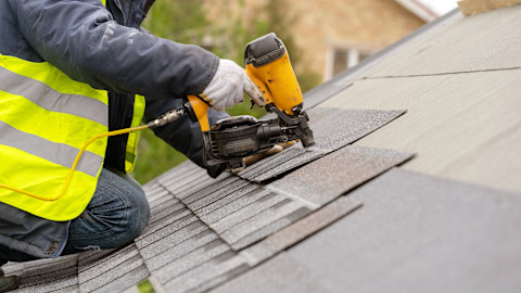 worker-installing-new-roof