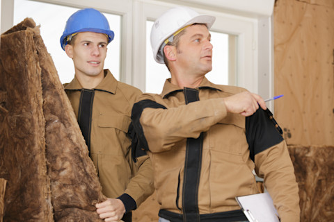 Two men are preparing to board a loft