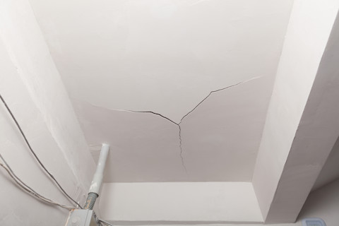 Large crack in ceiling plaster