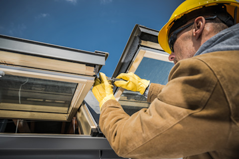 Close-up image of a skylight being repaired.