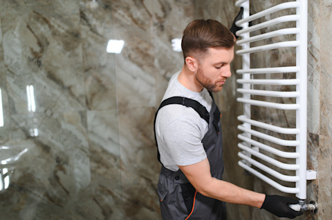 Heated towel rail installation
