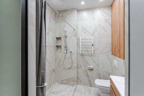 Bathroom with small heated towel rail