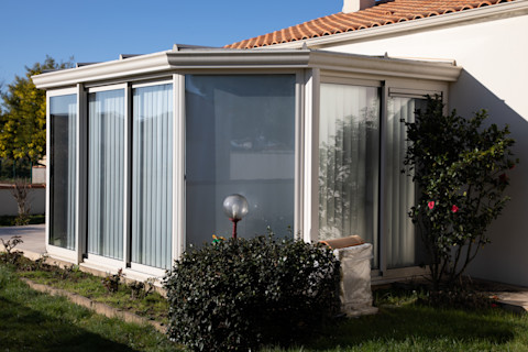 A traditionally designed white conservatory extension