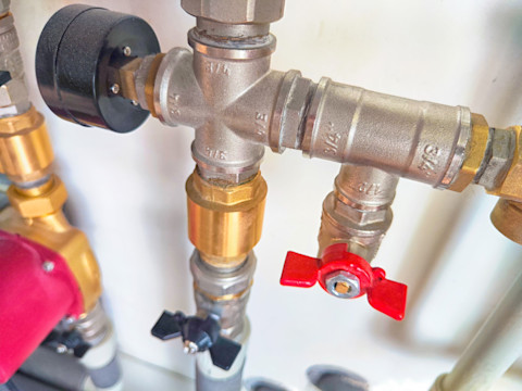 This image shows a close-up of a water shut off valve. 