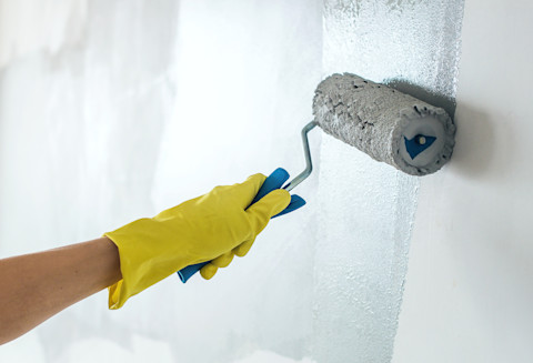 Painting wall with a roller