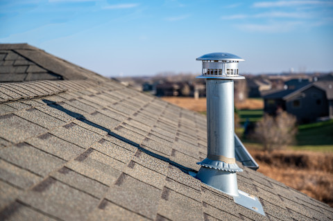 Chimney Cap installed on a roof of the house