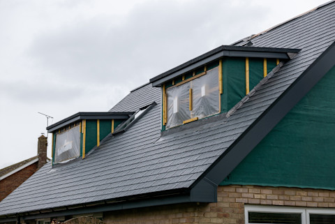 A dormer loft conversion is underway.