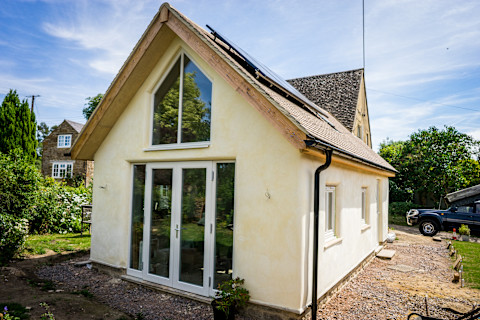 The image showcases a garage conversion into a part of a residential home.