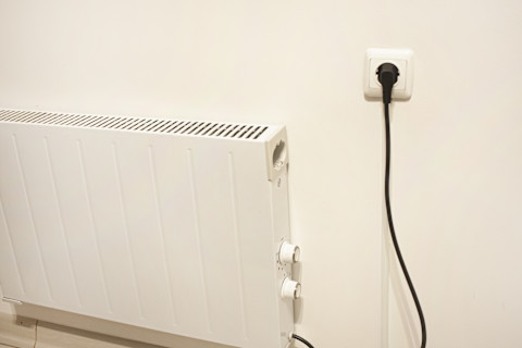 A heater that plugs into a wall socket.