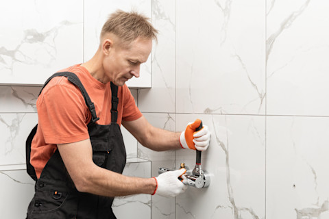 Man installing a shower
