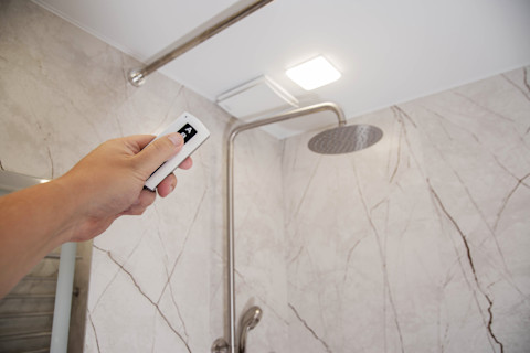 Control panel for remote exhaust ventilation in the bathroom.
