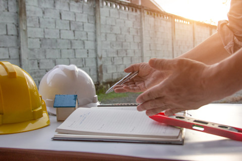 A tradesperson is planning a new conservatory build