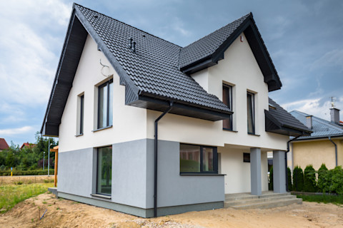 Newly built house with a finished plaster and paint.