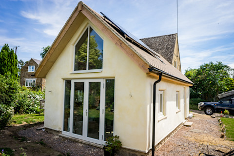 The image showcases a garage conversion into a part of a residential home.