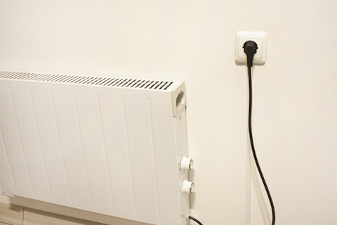 A heater that plugs into a wall socket.
