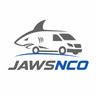 Jaws and co man in a van