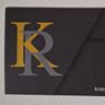 K R